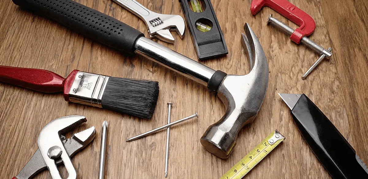 Handyman tools laid out for home repair and maintenance work in Dover, DE